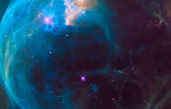 Image abstraite de l'espace évoquant des gaz et des étoiles.