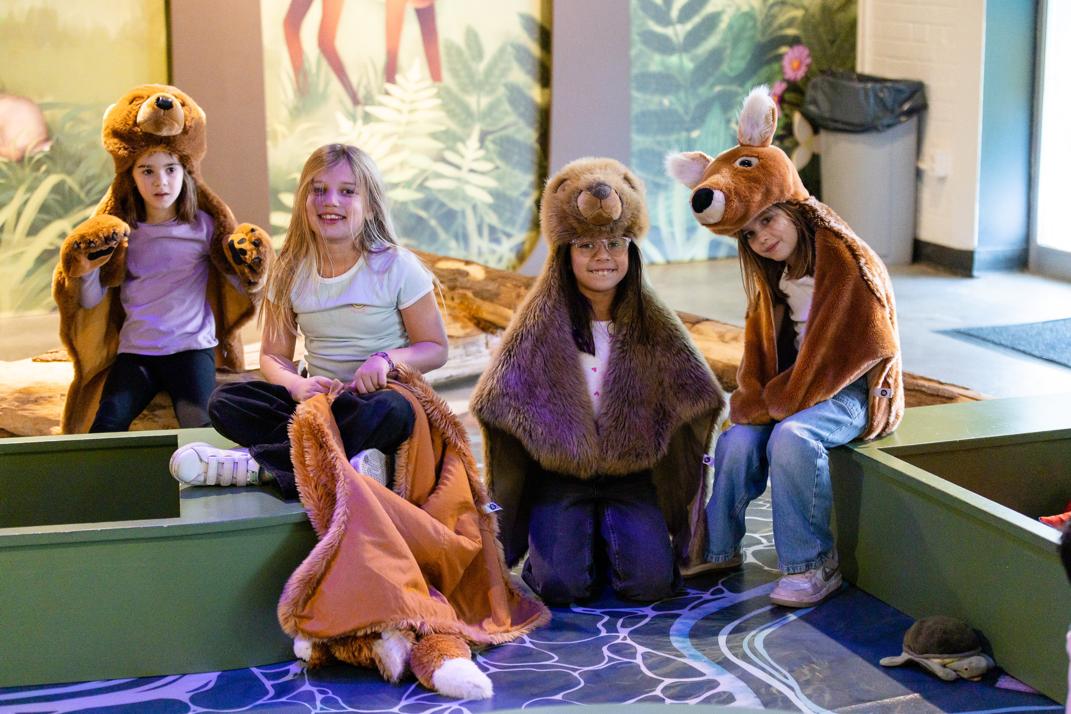 Kids playing in the pond region of KidSpark