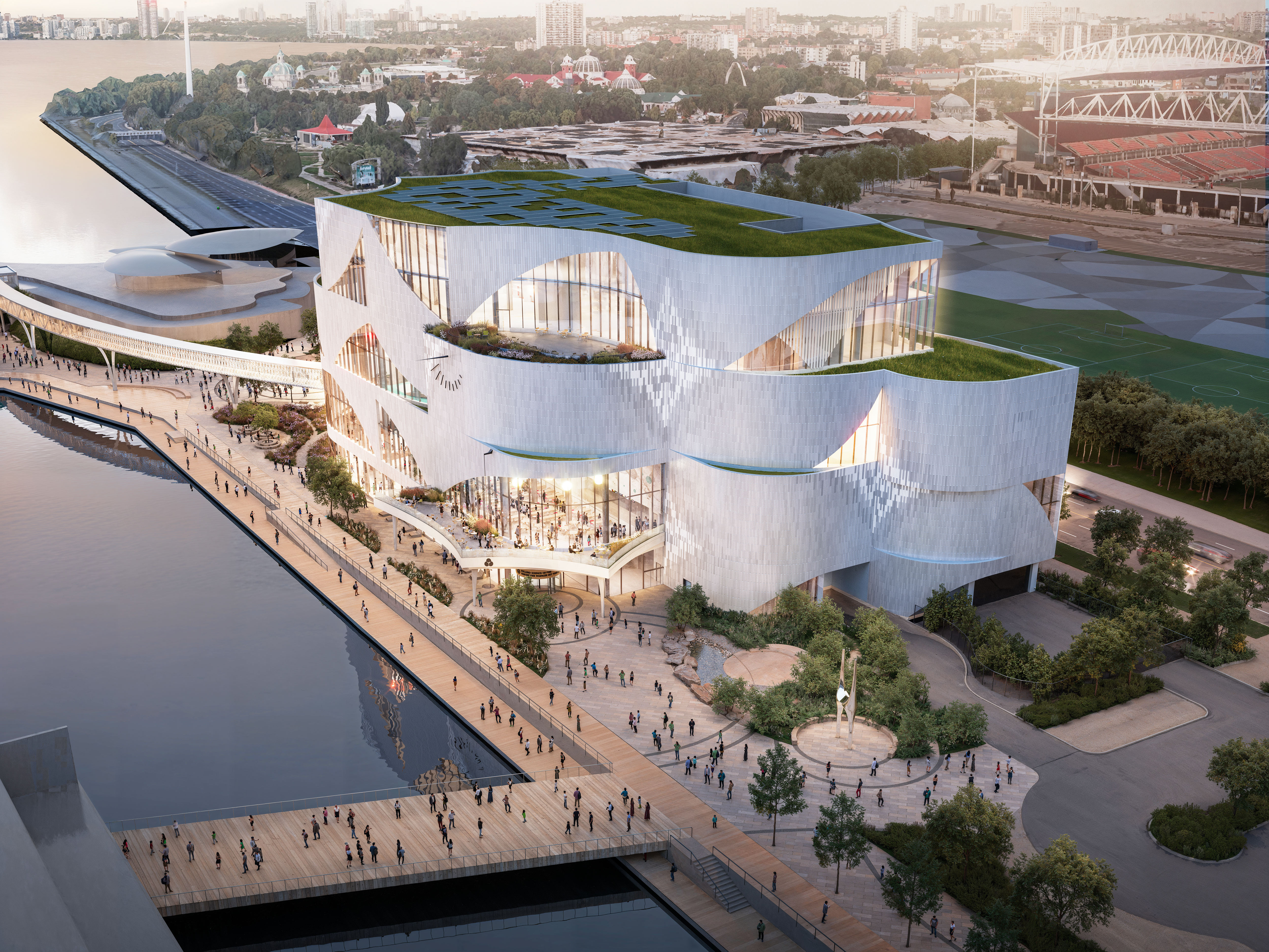 Le Centre des sciences de l'Ontario : nouveau bâtiment, vu d'en haut en direction nord-ouest, montrant le toit vert et les panneaux solaires.