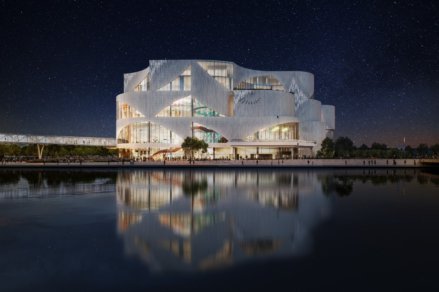 Le Centre des sciences de l'Ontario : nouveau bâtiment, côté sud orienté vers le nord, face à l'eau, la nuit.